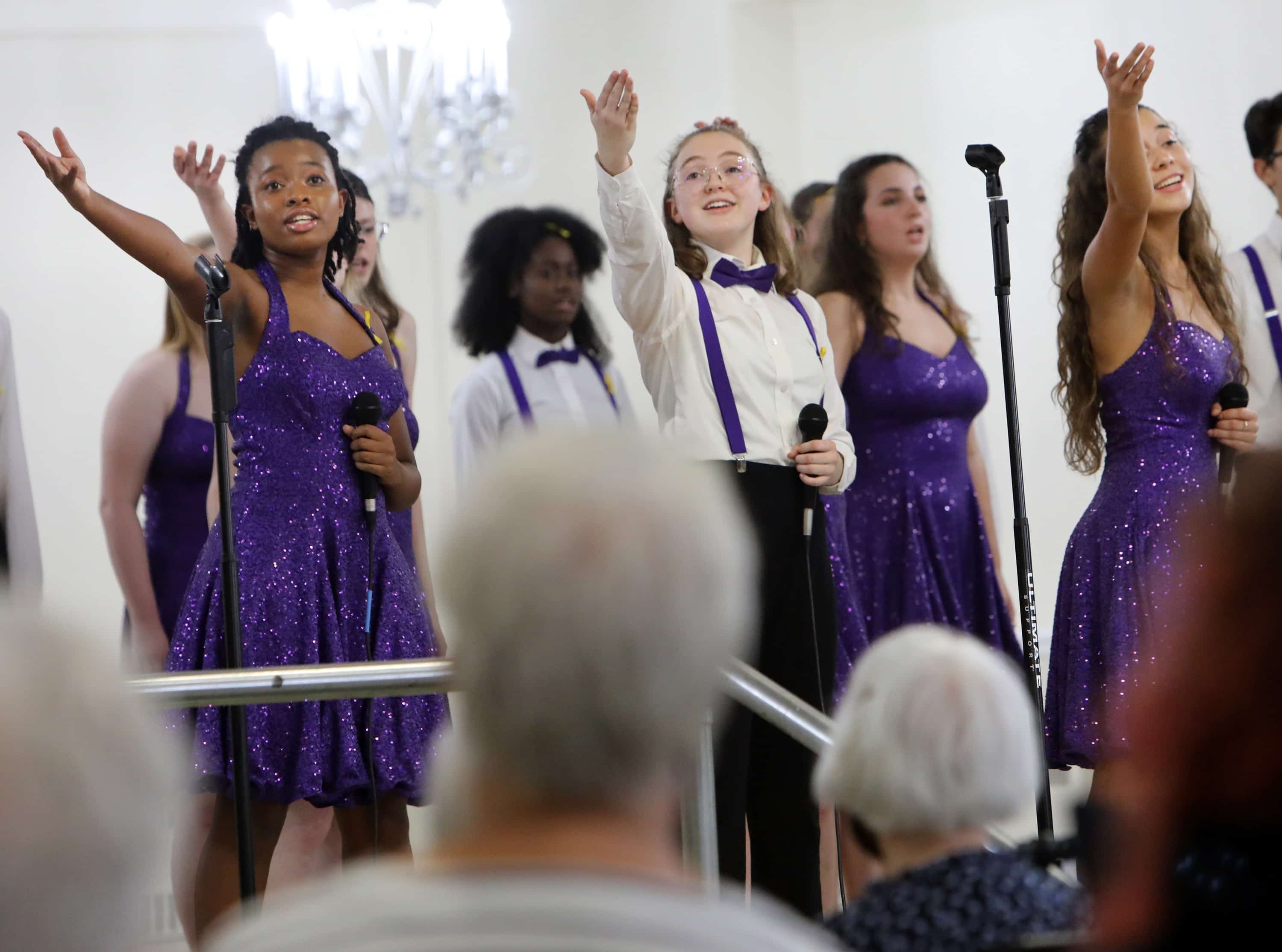 OPRF High School Show Choir Noteworthy performed at Oak Park Arms as residents and members of the community enjoy the show
