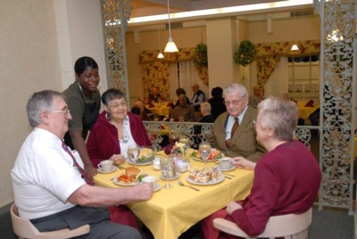 Seniors at the full service restaurant within the Oak Park Arms