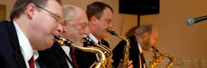 Horn section of a big band at the Monday Night Concert Series