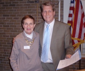Pat Koko, outreach coordinator of the Oak Park Arms Adult Day Care with David Pope, Oak Park village president