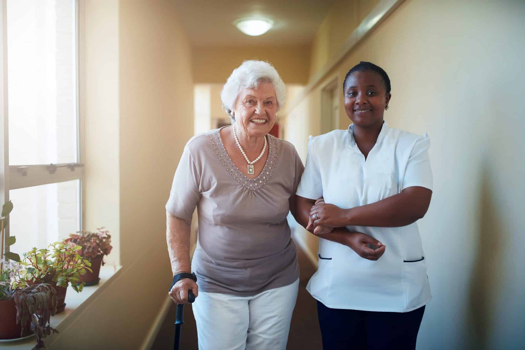 Senior and Caregiver walking