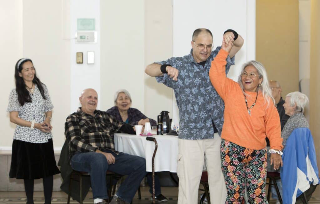 Todd Martin and Gloria Rocco dance during Oak Park Arms Senior Living Spring Dance with the Falconaires. Saturday, April 22, 2023, in Oak Park, Ill. 
