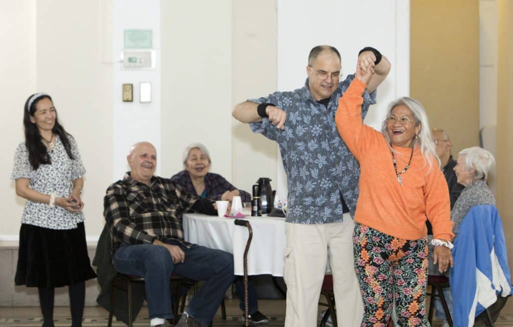 Todd Martin and Gloria Rocco dance during Oak Park Arms Senior Living Spring Dance with the Falconaires. Saturday, April 22, 2023, in Oak Park, Ill.