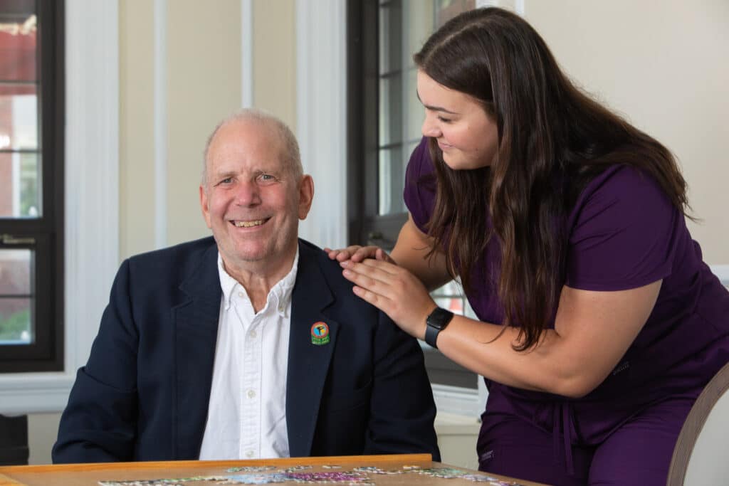 Senior and caregiver at Oak Park Arms