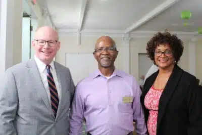 Don Harmon, 39th president of the Illinois Senate; Moses Williams, executive director of the Oak Park Arms; and Camille Lilly, assistant majority leader of the Illinois House of Representatives